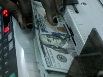 今年6月末中国对外金融资产首破11万亿美元